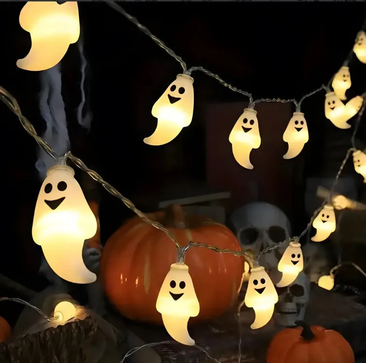 PVC Halloween lighting chain with pumpkin, ghost and bat shapes in warm white LED glow