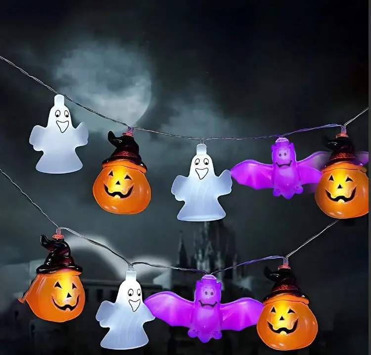PVC Halloween lighting chain with pumpkin, ghost and bat shapes in warm white LED glow
