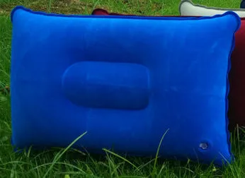Rectangular PVC flocking inflatable camping pillow 38x24cm in grey on outdoor ground