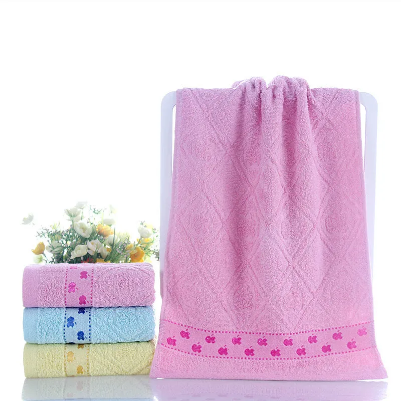 Cotton face towel 73x33cm in blue pink yellow patterns on hanger