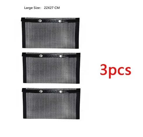 Reusable non-stick BBQ grill mesh bag on a grill with food, heat-resistant and food-safe