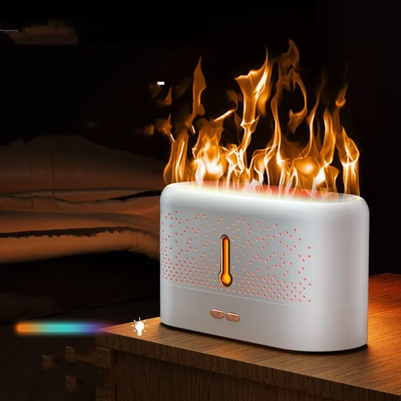 White ultrasonic aromatherapy diffuser with 200ml tank, USB cable, and essential oil bottle on a desk