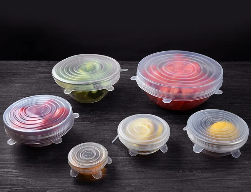 Six round stretch silicone covers in assorted colours, sizes 2.6 to 8.3 inches