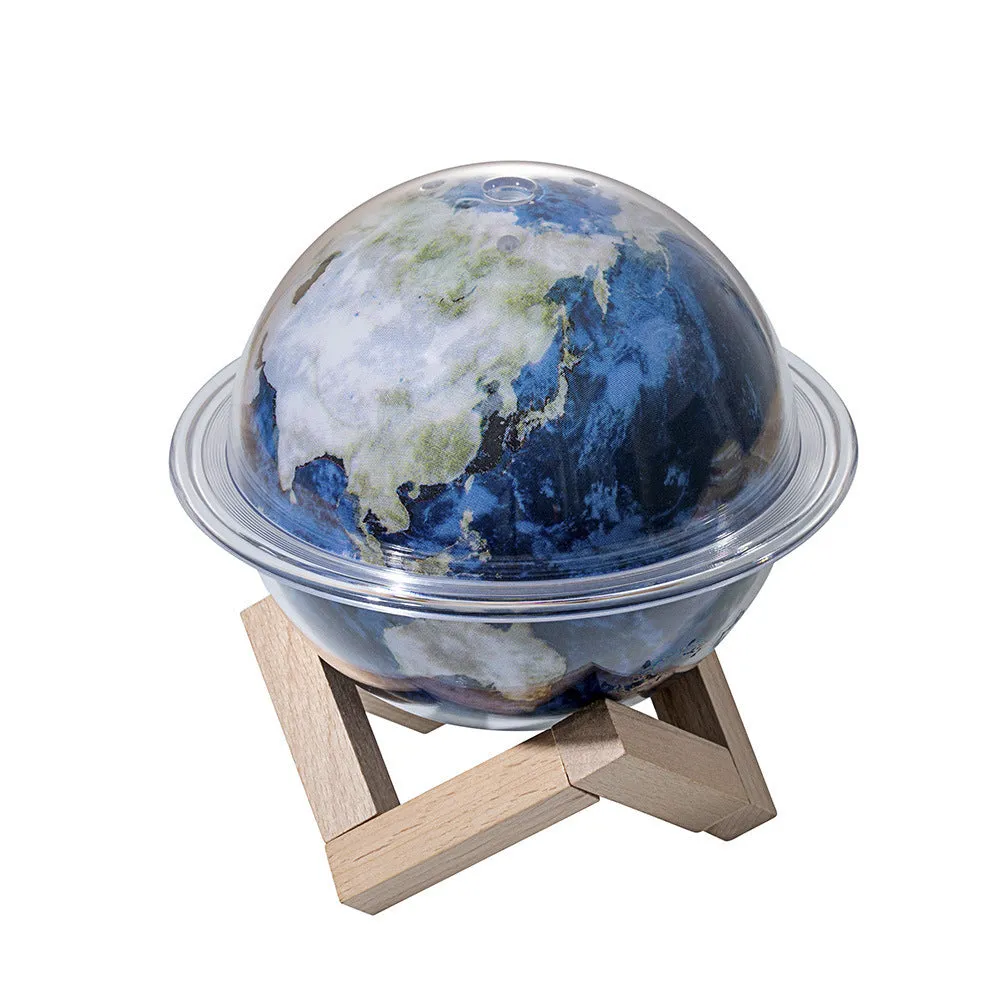 Moon-shaped projection lamp humidifier with 3 LED colours and 250ml tank on desk
