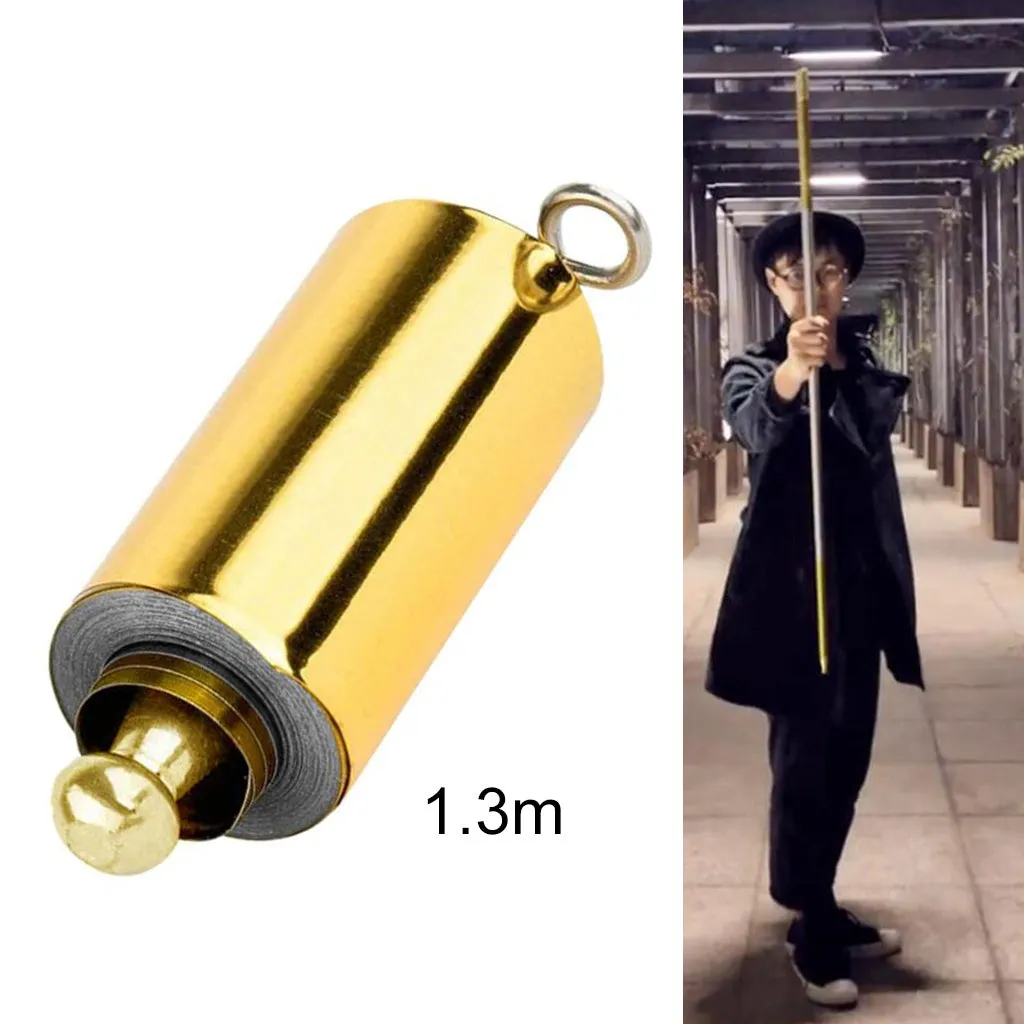 Metal telescopic magic wand in silver finish extended to full length on a dark background