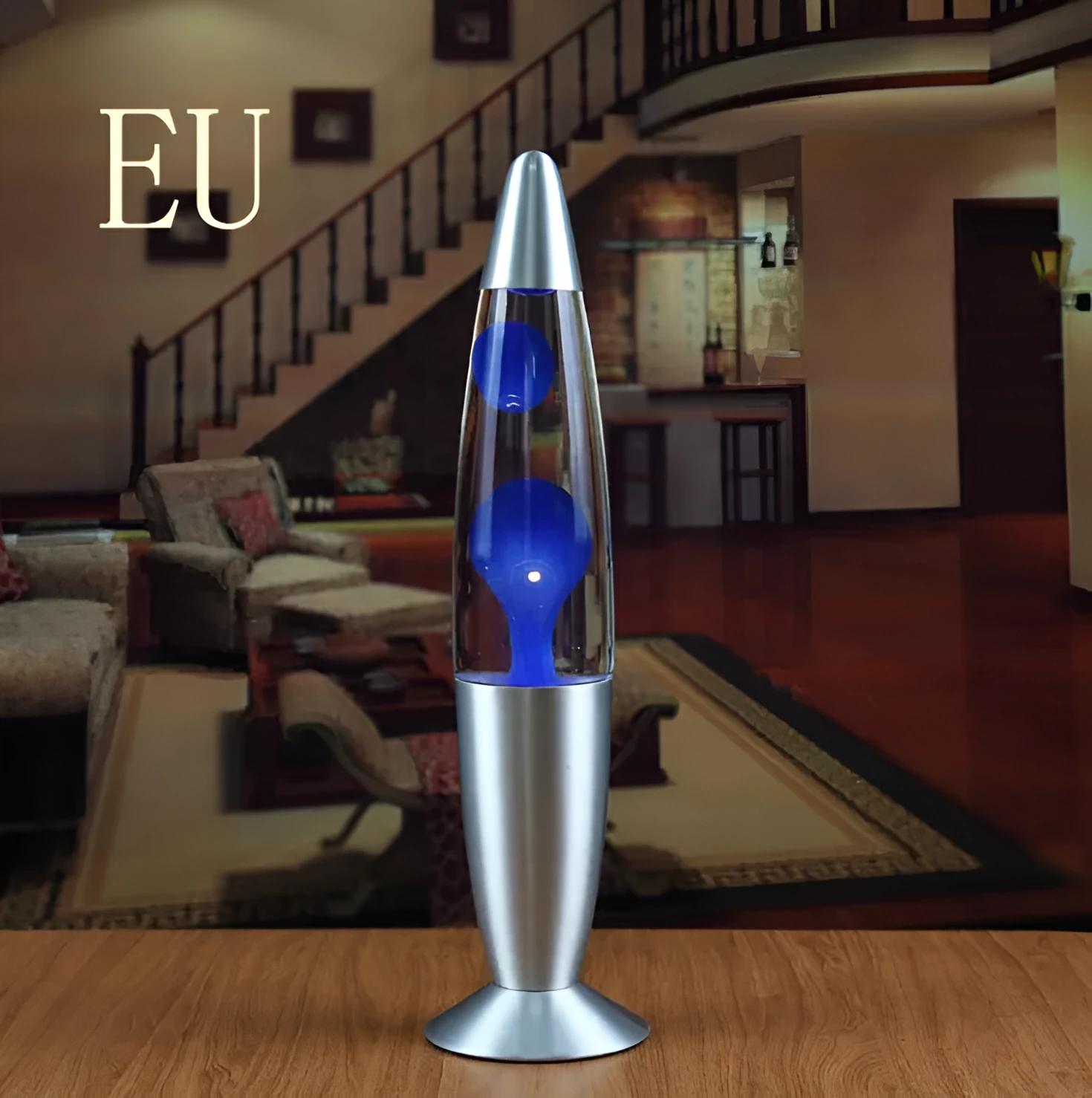 Blue lava lamp with metal base and glass bottle showing wax rising in heated liquid