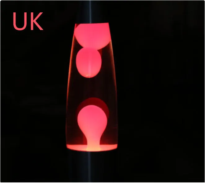 Blue lava lamp with metal base and glass bottle showing wax rising in heated liquid