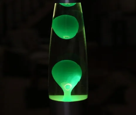 Blue lava lamp with metal base and glass bottle showing wax rising in heated liquid