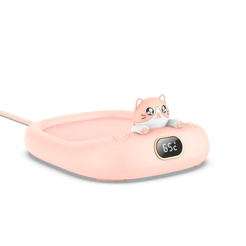 Pet cup warming holder in pink ABS and electroplated metal with a cup sitting on top
