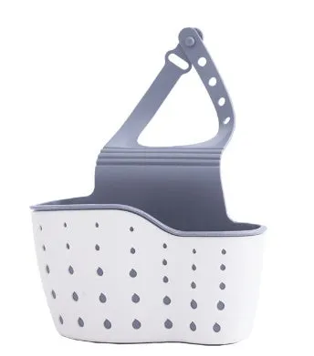 Set of three plastic kitchen sink storage racks in light blue, light pink, and beige on a countertop