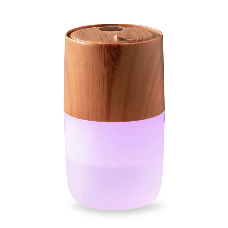 Mini USB jellyfish air humidifier in white with hollow ABS shell on desk