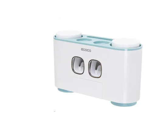 Plastic wall-mounted toothbrush holder with four magnetic cups in pink, blue, and green for family bathroom