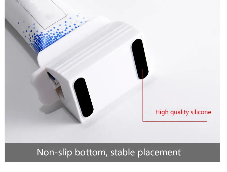 Large white ABS plastic toothpaste squeezer with red accents, used to squeeze toothpaste tubes flat