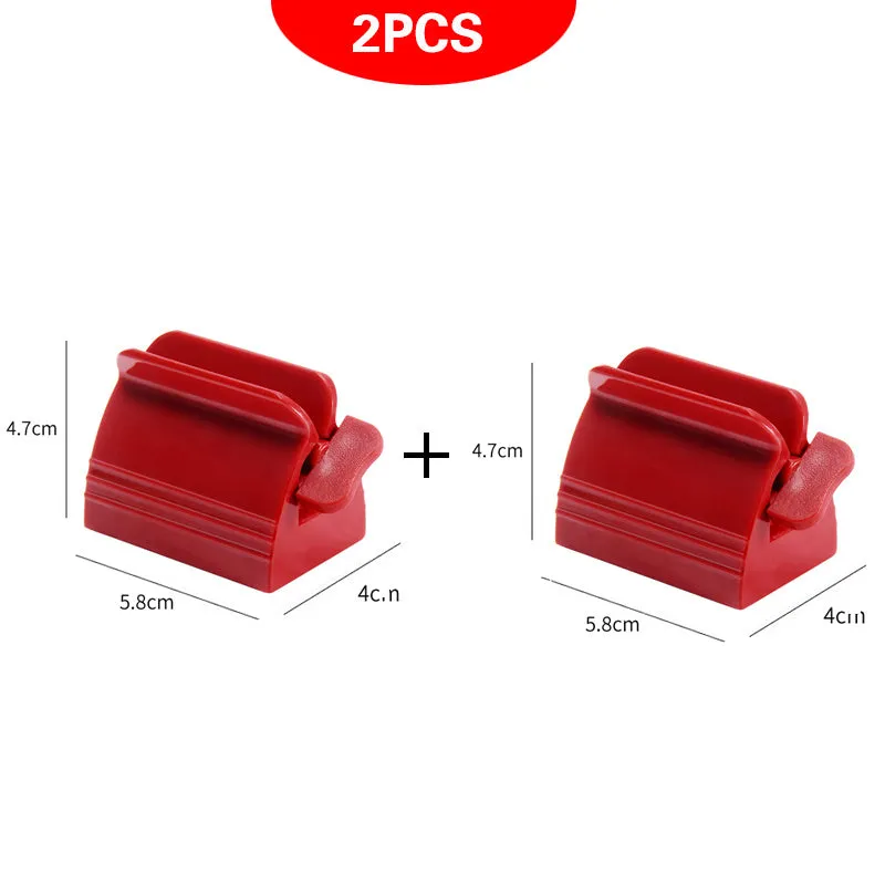 Large white ABS plastic toothpaste squeezer with red accents, used to squeeze toothpaste tubes flat