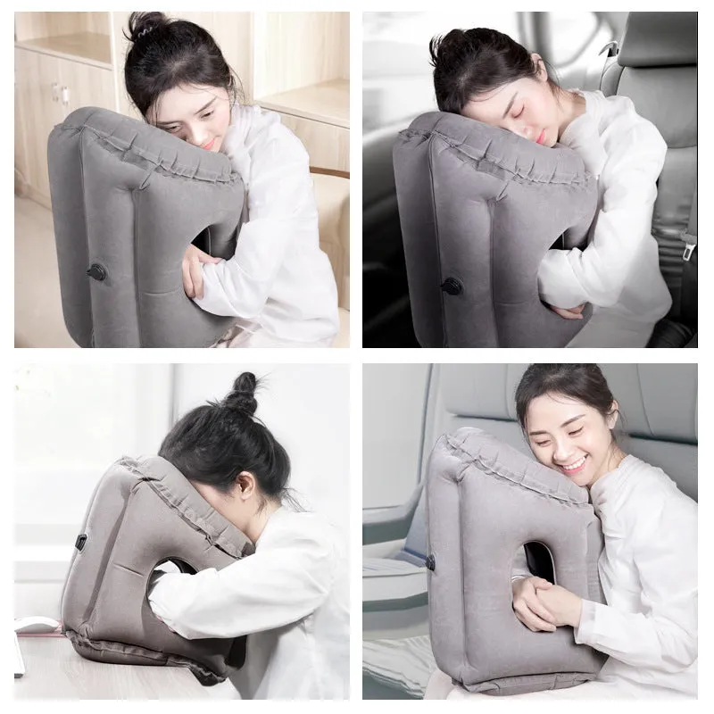 Grey inflatable travel pillow with flocking surface, M size 26cm x 31cm x 51cm, shown inflated with storage bag