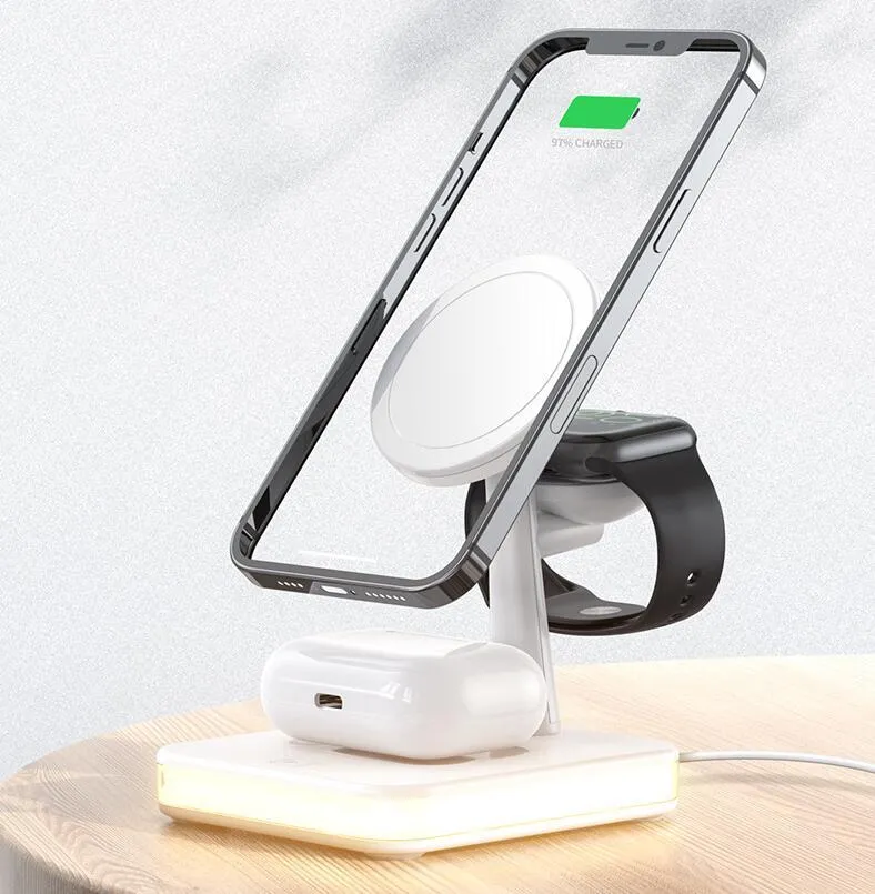 Three-in-one magnetic wireless charger with night light holding an iPhone, Apple Watch, and AirPods on a desk