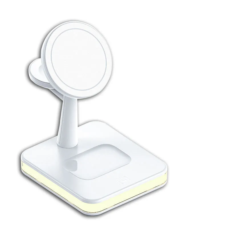 Three-in-one magnetic wireless charger with night light holding an iPhone, Apple Watch, and AirPods on a desk