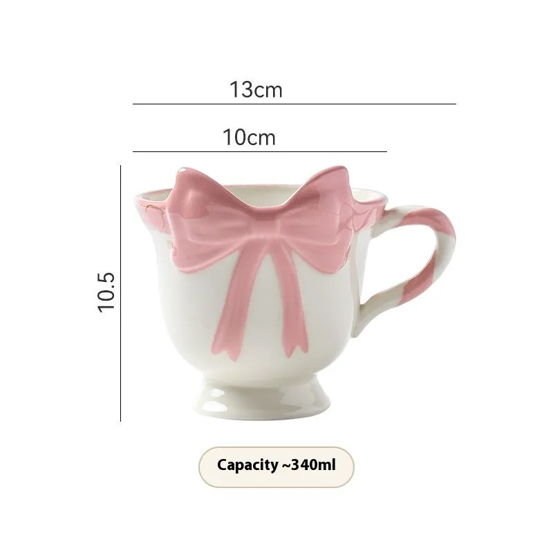 White ceramic mug with heart and bow design, 301-400ml capacity, bow-shaped handle
