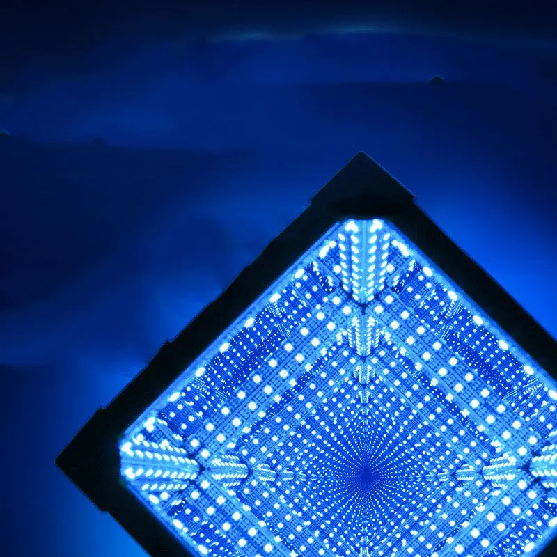 Thousand Mirrors 3D magic cube RGB LED lamp in black finish with remote control on desk