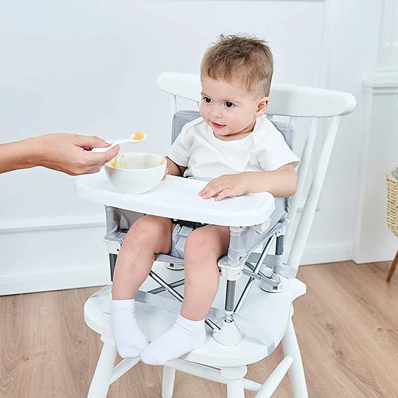 Foldable baby dining chair with metal frame, removable tray, and safety belt in grey
