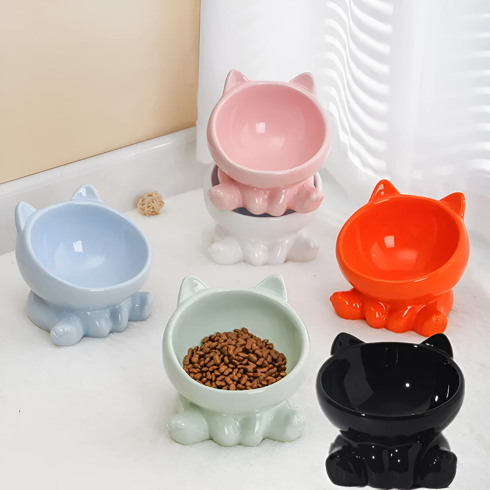 Ceramic cat bowl with oblique mouth and neck guard in black and white colour option