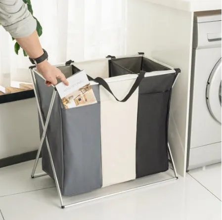 Foldable three-compartment laundry basket in Oxford cloth with aluminium frame, collapsed for space-saving storage