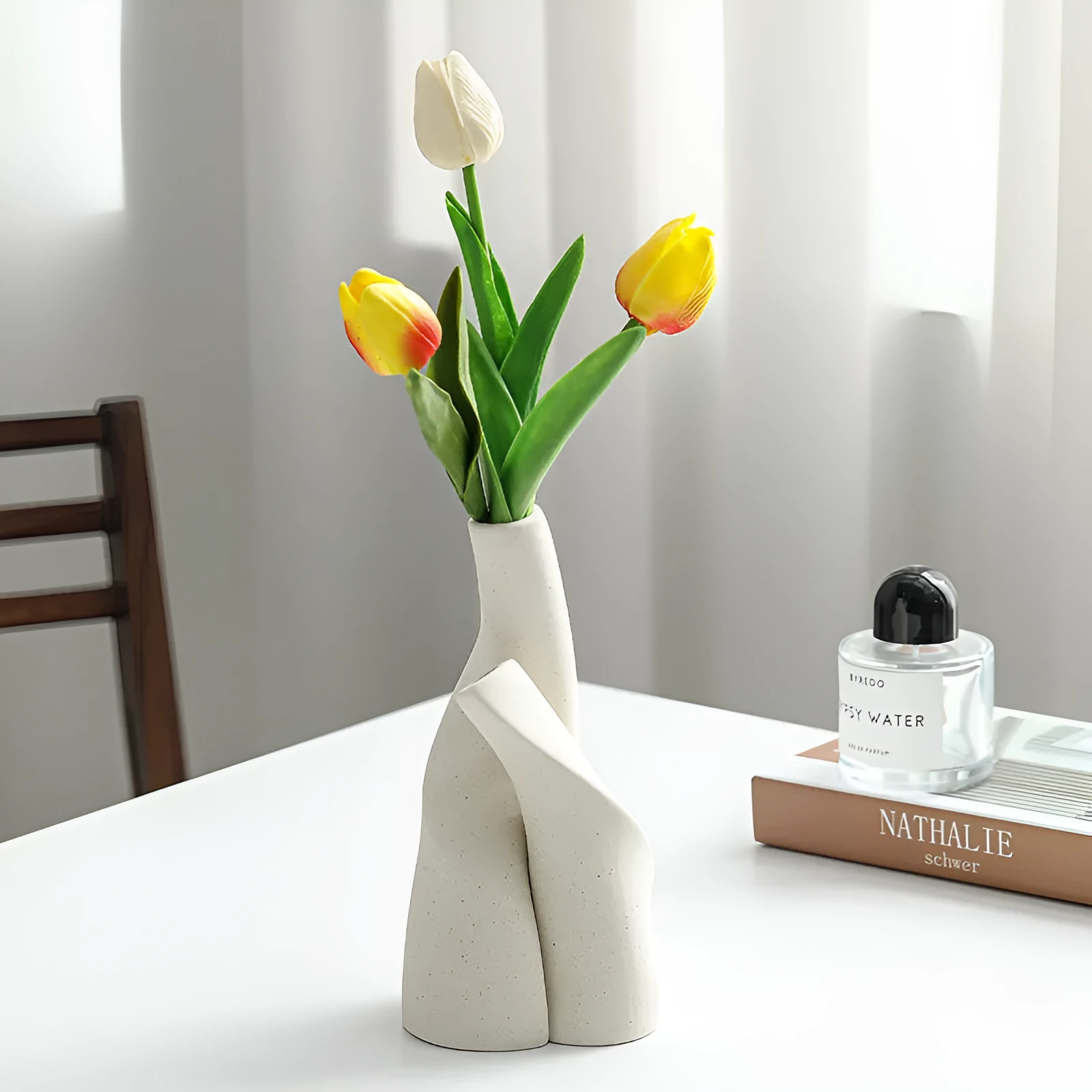 Ceramic shaped double vase in cream colour for Nordic home decoration on shelf