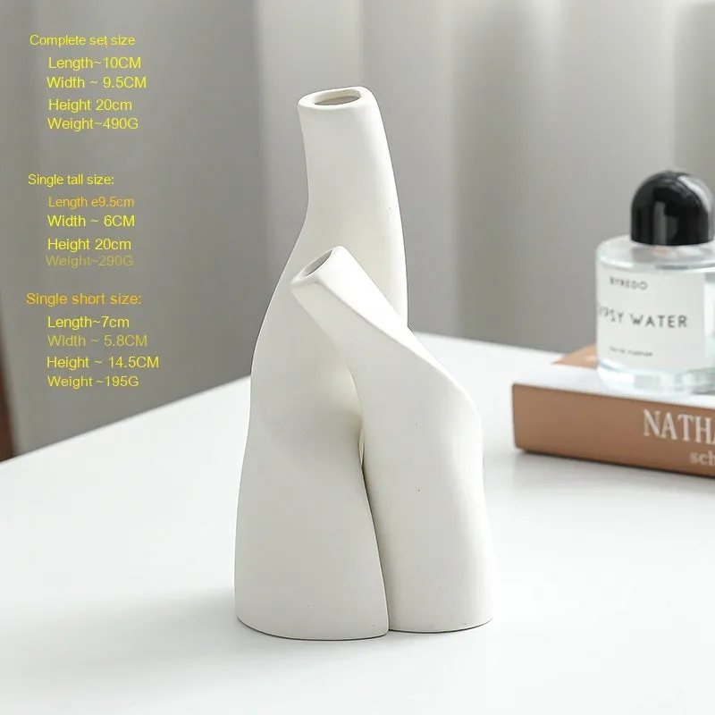 Ceramic shaped double vase in cream colour for Nordic home decoration on shelf