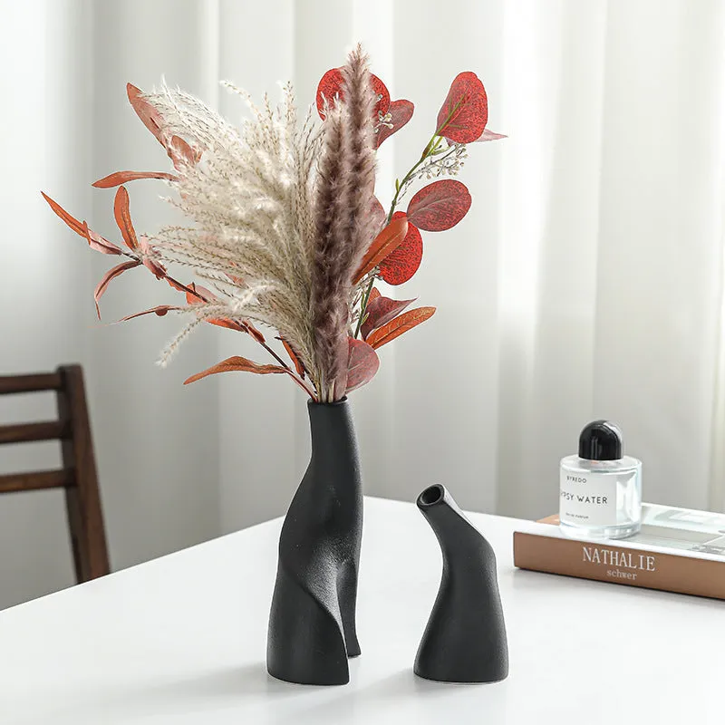 Ceramic shaped double vase in cream colour for Nordic home decoration on shelf