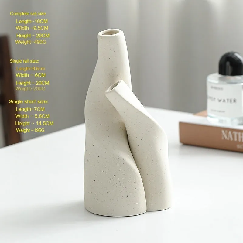 Ceramic shaped double vase in cream colour for Nordic home decoration on shelf