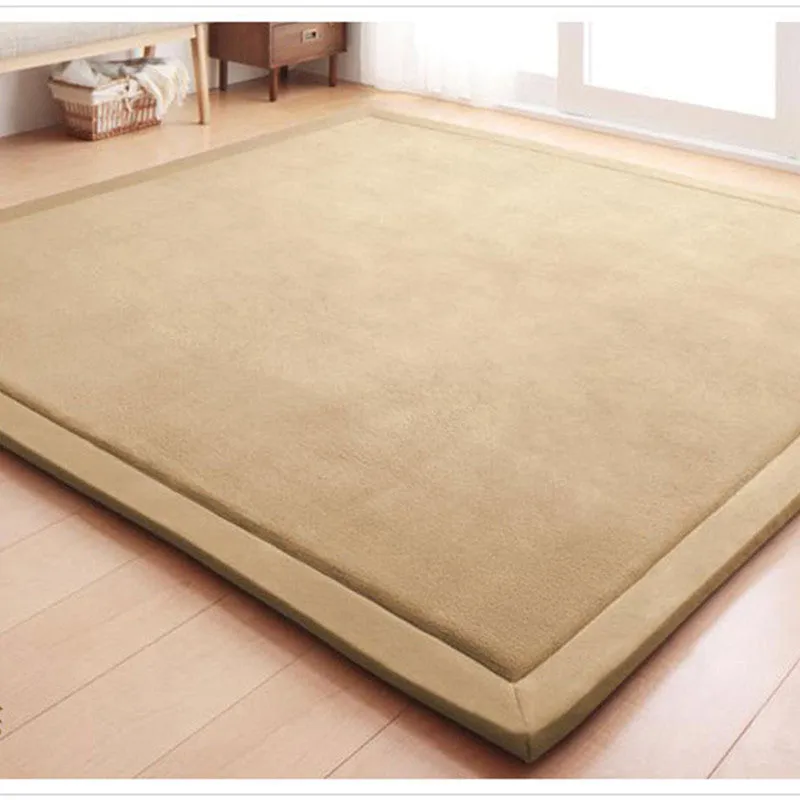 Thick coral velvet non-slip tatami mat in olive green, hand woven finish, placed on wooden floor