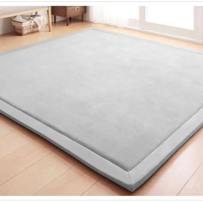 Thick coral velvet non-slip tatami mat in olive green, hand woven finish, placed on wooden floor