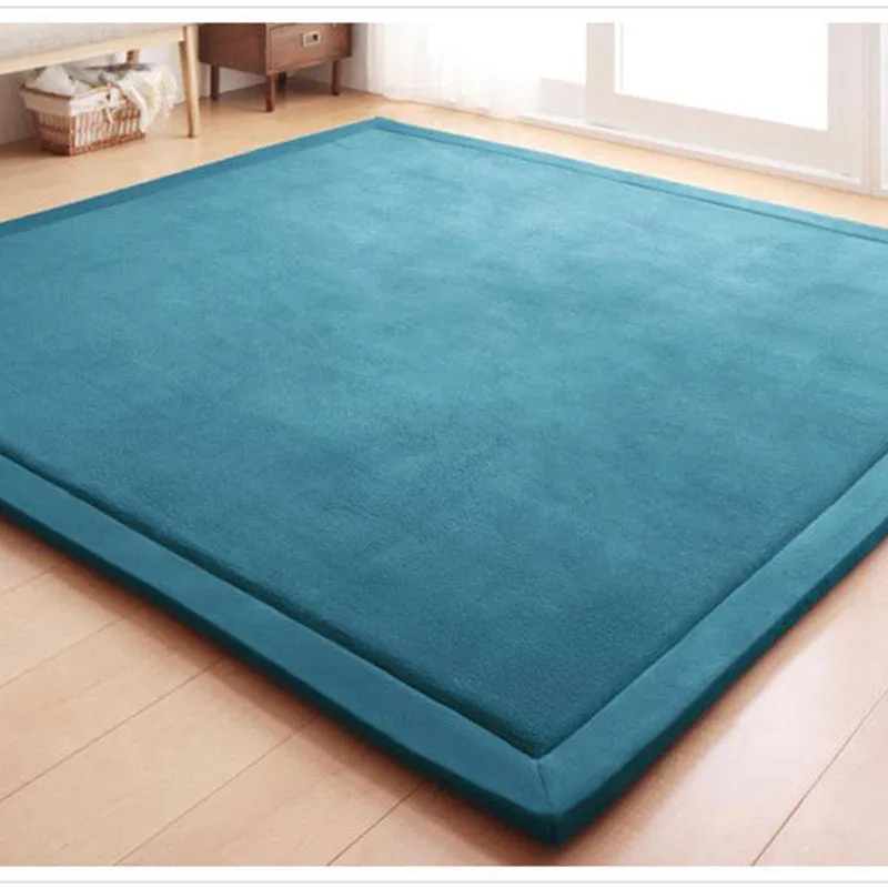 Thick coral velvet non-slip tatami mat in olive green, hand woven finish, placed on wooden floor
