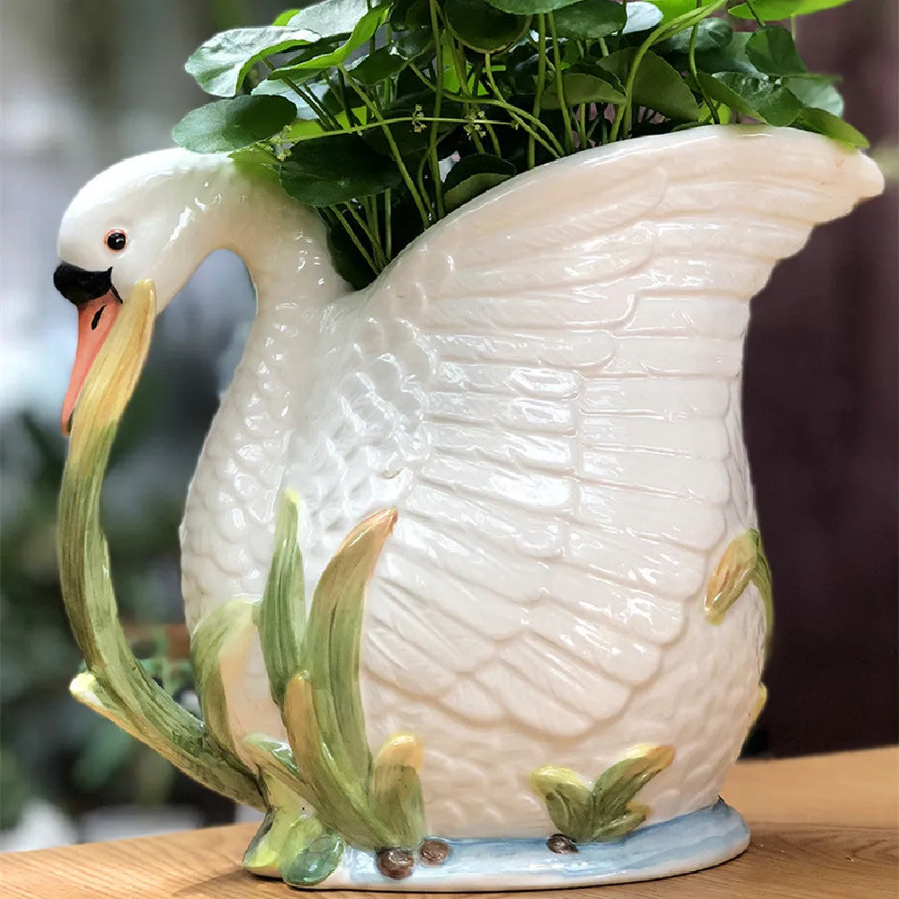 Ceramic vase with embossed swan design in pastoral style, dimensions 24.1x15.2x20cm, picture colour