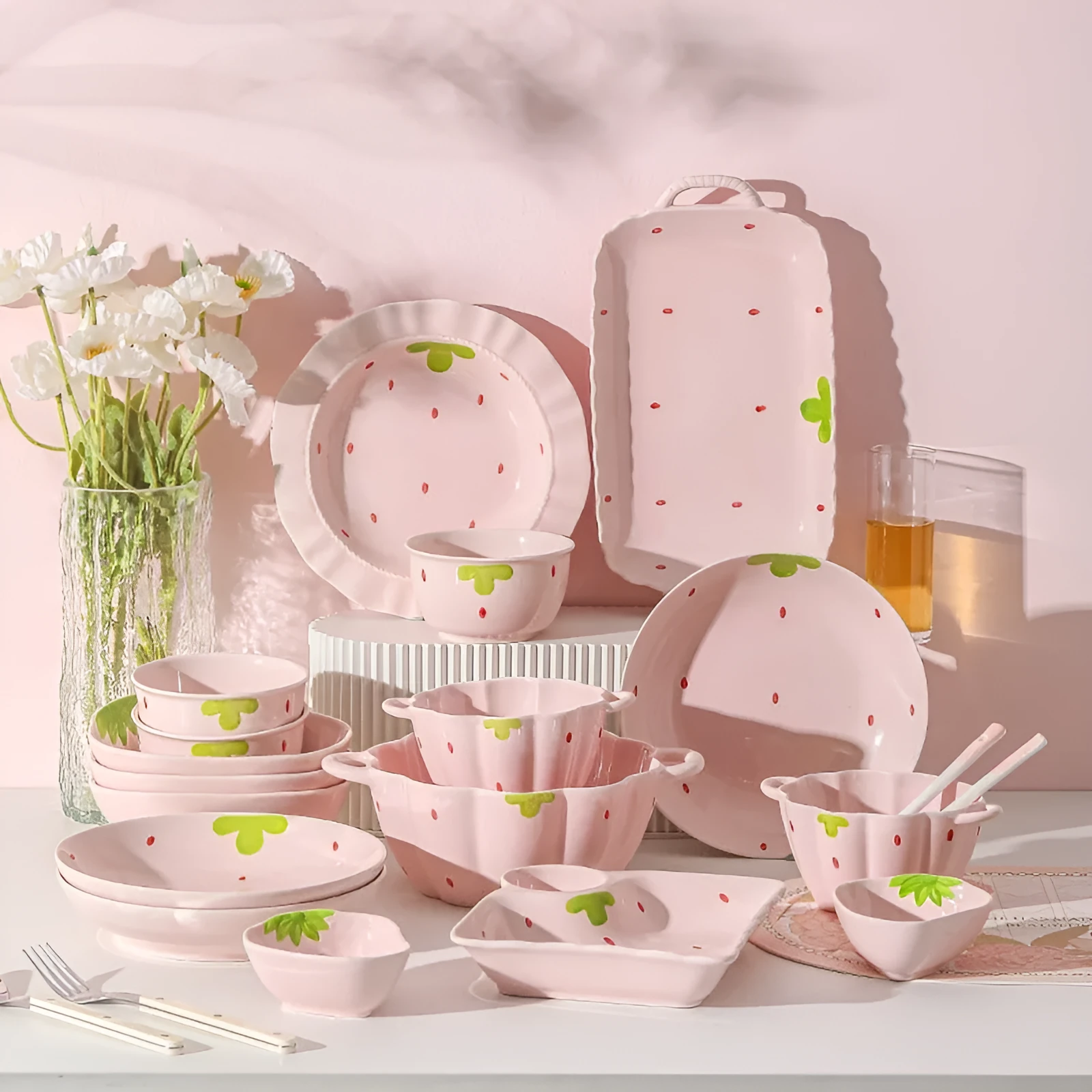 Cute strawberry-themed porcelain dinnerware set with flower bowl, fish dish, plates, and spoon.
