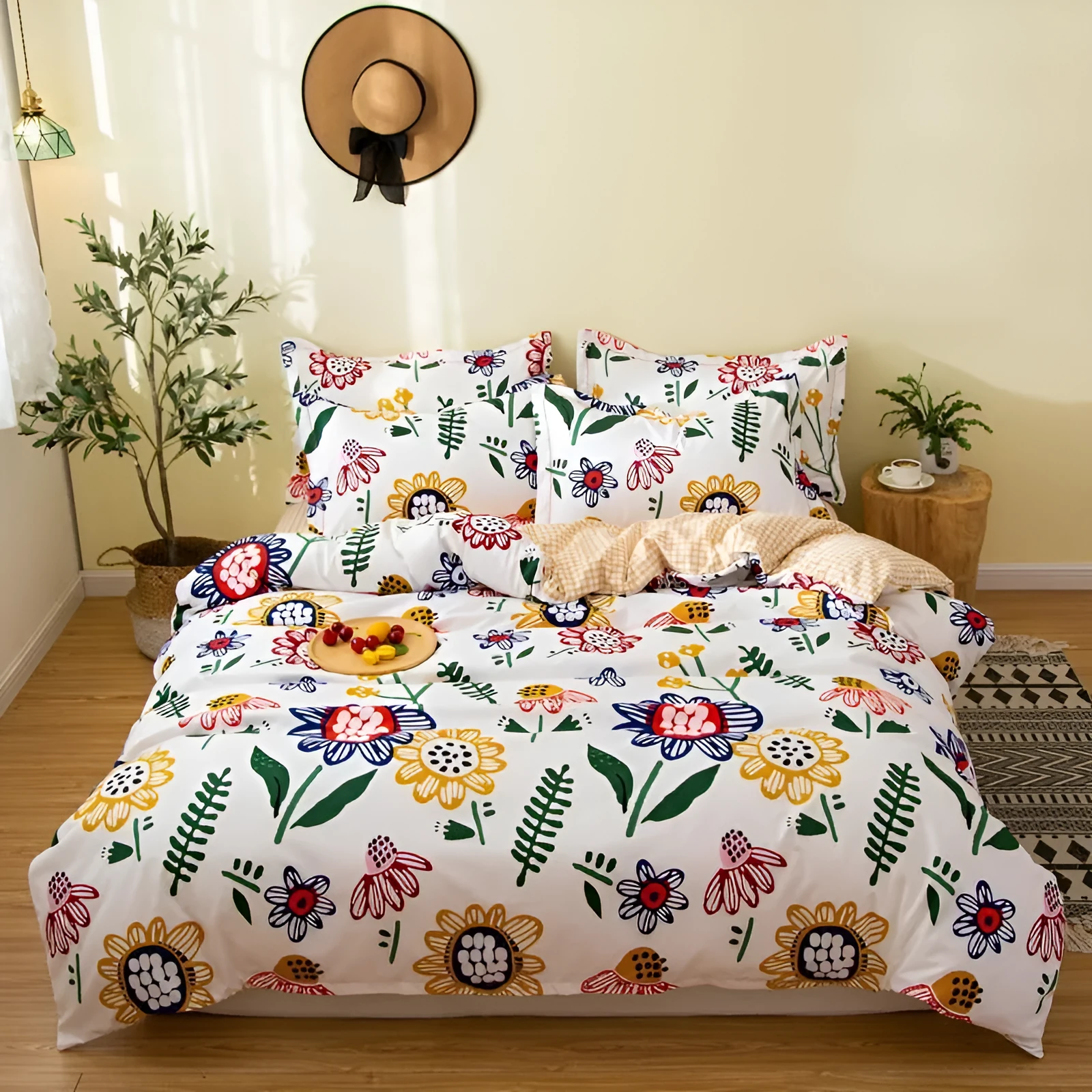 Cotton duvet cover and fitted sheet bedding set in a colour option, shown on a bed