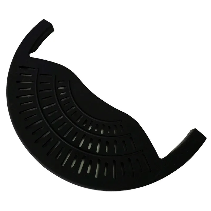 Black silicone food oil drainer snapped onto a pot rim, with liquid being poured off