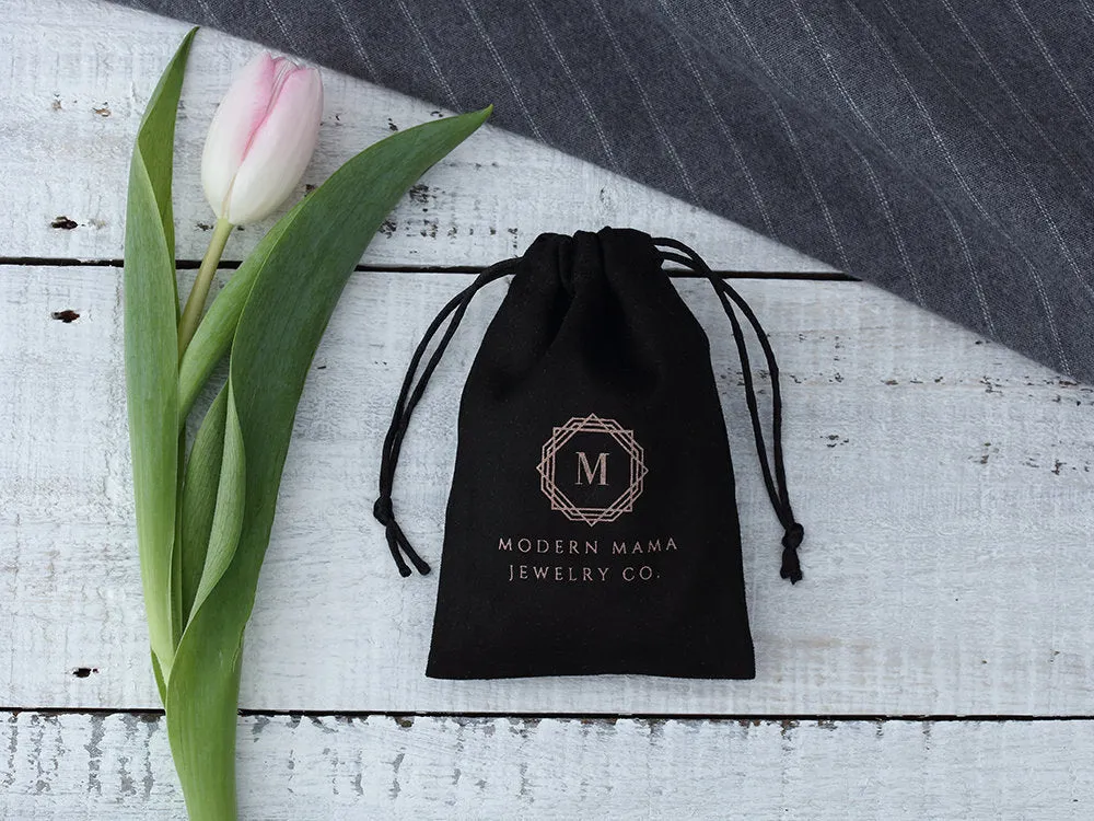 Flannel drawstring storage pouch in coffee colour, 9x12cm size, with drawstring closure on white background.