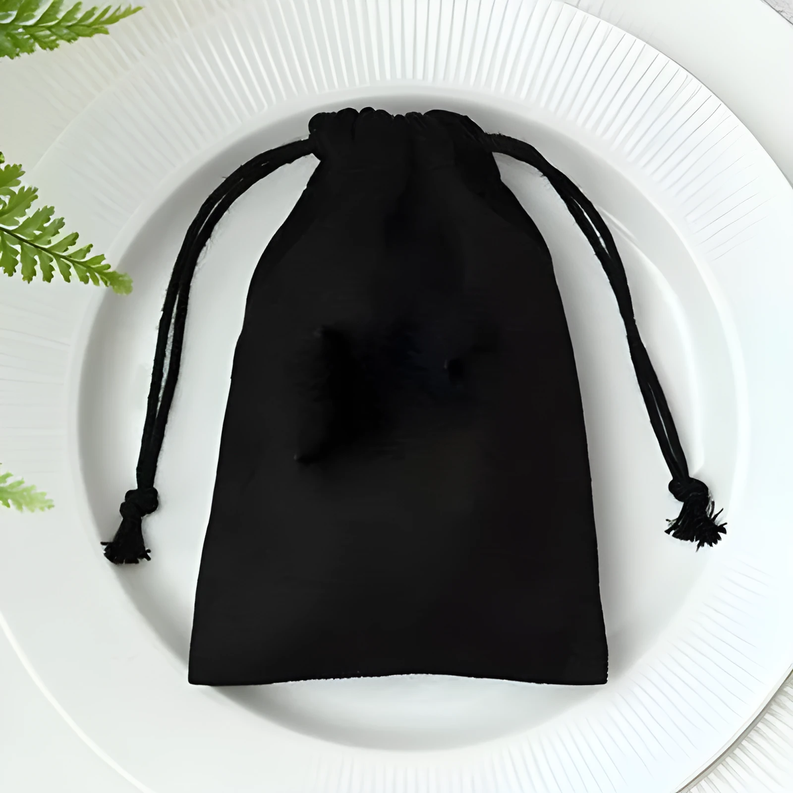 Flannel drawstring storage pouch in coffee colour, 9x12cm size, with drawstring closure on white background.