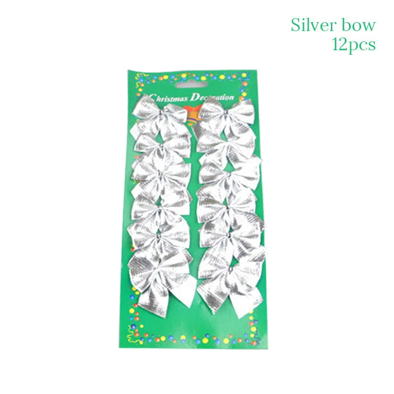 Christmas gift bag decoration set with golden bow, red bow, silver bow, train motifs, stickers, and paper bag