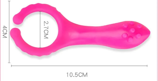 Seismic Clip silicone vibrating clitoral stimulator in rose red, 103mm long, lying flat on a clean surface