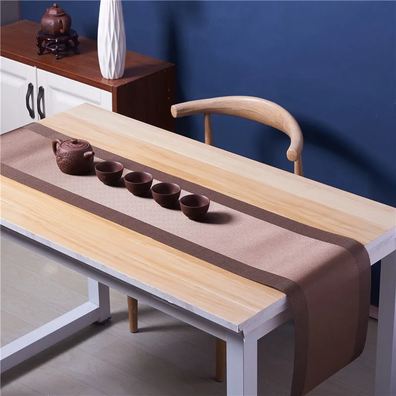 PVC non-slip kitchen sink mat in gradient bamboo black colour, shown in 30x180cm size on a countertop.