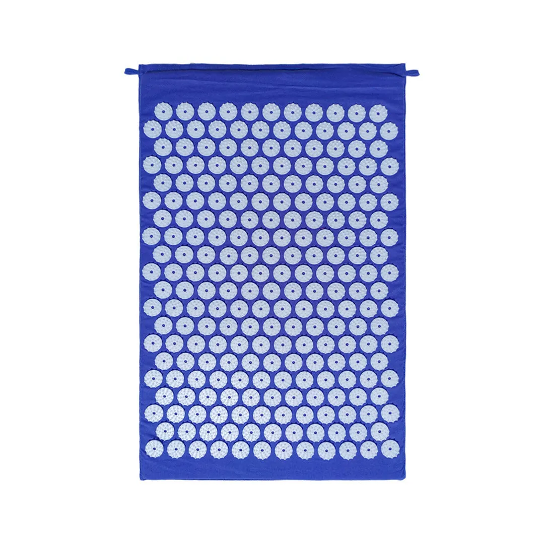 Acupuncture massage mat yoga mat set with black and blue cushion and headrest on floor