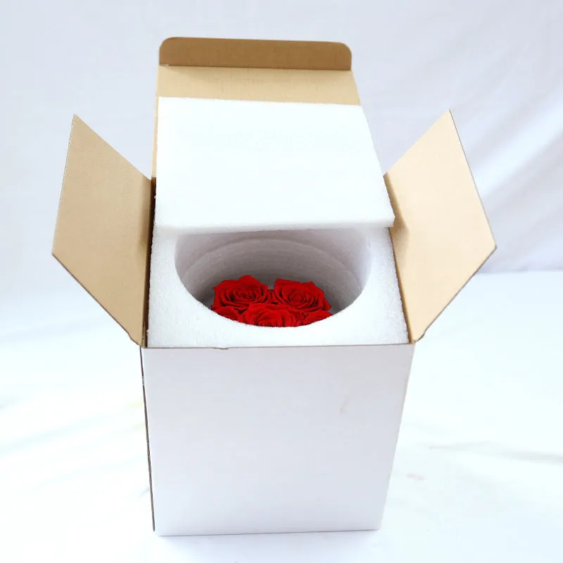 Handmade everlasting rose in hug bucket with preserved flower material, available in white red pink black blue colours