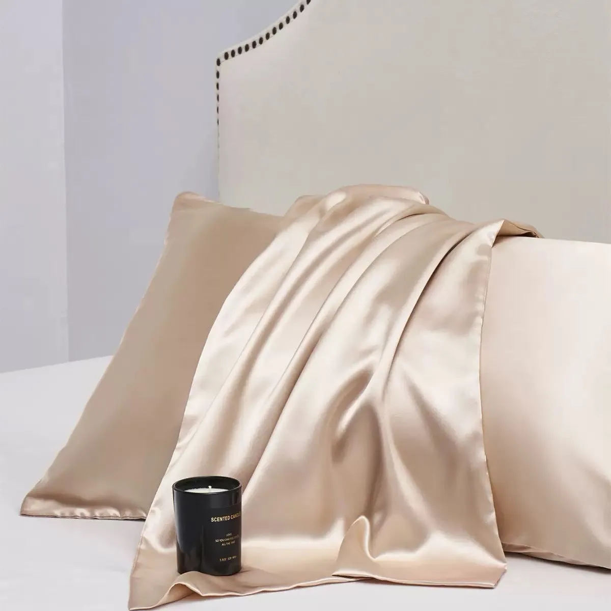 A pair of solid colour satin cloth pillowcases in a choice of thirteen colours including navy blue and rose red.