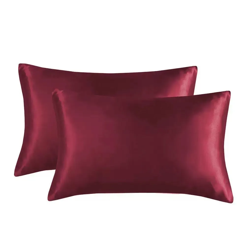 A pair of solid colour satin cloth pillowcases in a choice of thirteen colours including navy blue and rose red.