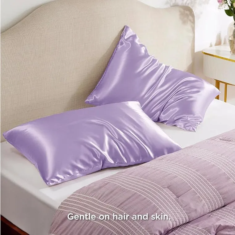 A pair of solid colour satin cloth pillowcases in a choice of thirteen colours including navy blue and rose red.