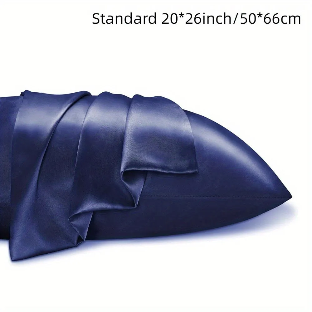 A pair of solid colour satin cloth pillowcases in a choice of thirteen colours including navy blue and rose red.