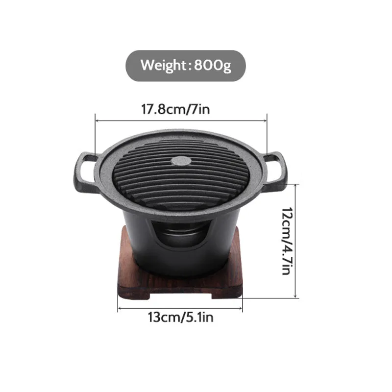 Mini BBQ grill alcohol stove with double-head flame and non-stick plate on tabletop