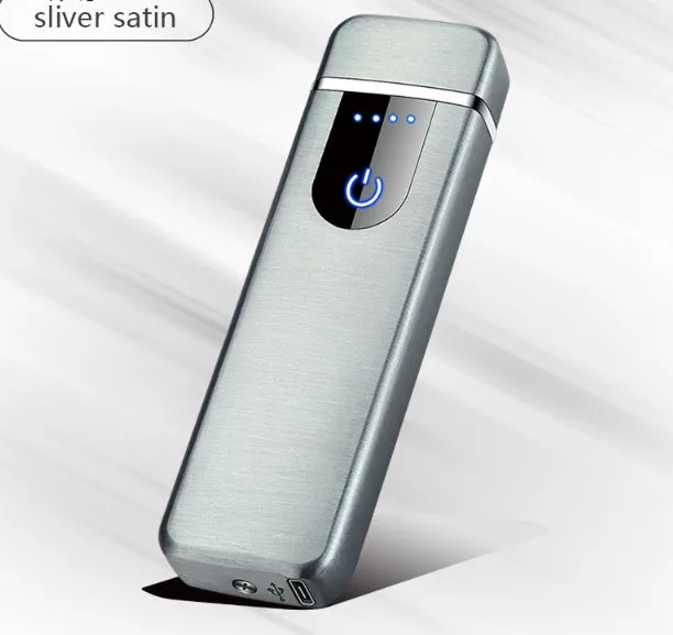 Brushed metal lighter in gold finish on a plain background.